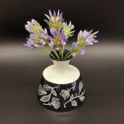 Black and white bottle vase, decorated with sgraffito leaves
